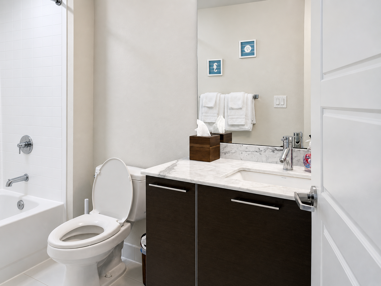 Bathroom with marble countertop and modern fixtures