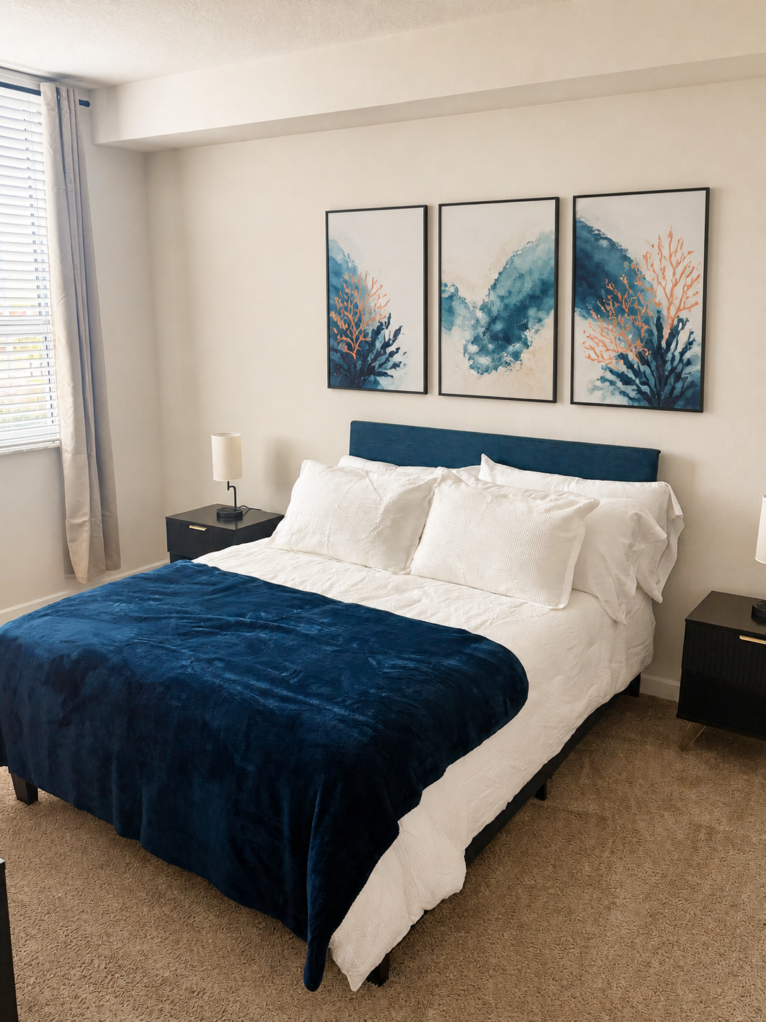 Primary bedroom with smart TV and modern dresser