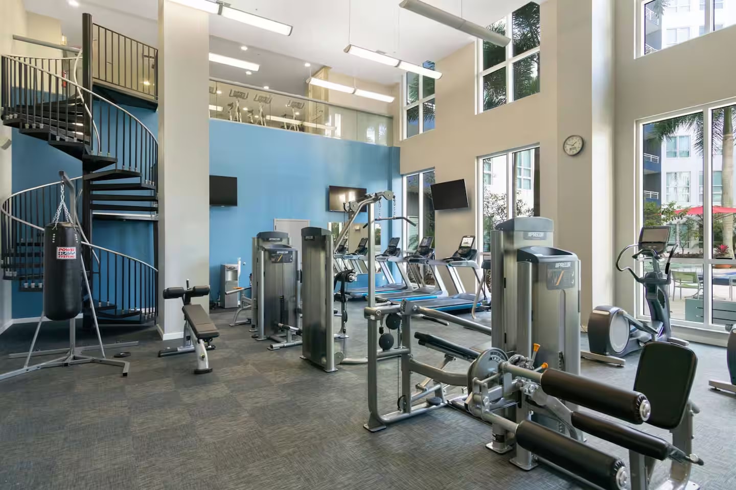 Full fitness center with cardio and weight equipment